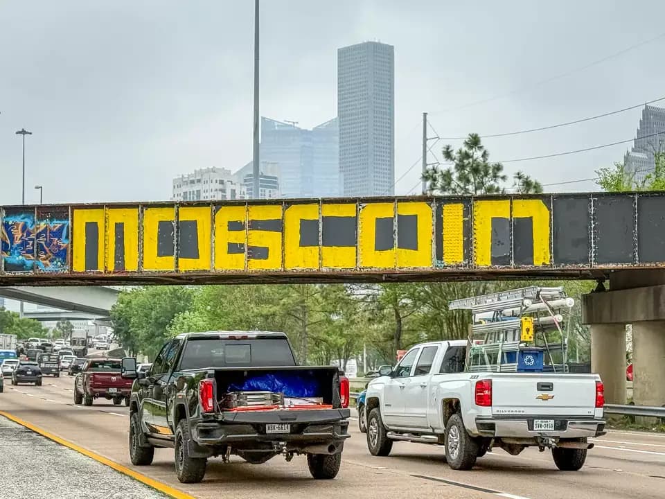 The 'Be Someone' mural above Interstate 45